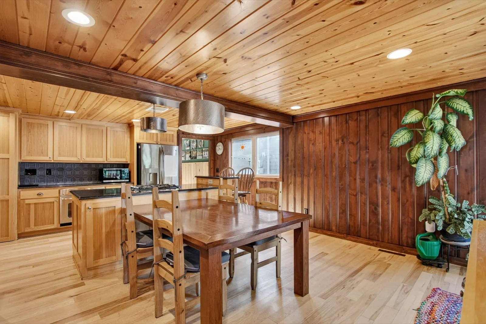 Dining area with a view into the kitchen at 31 H Street, Lake Lotawana