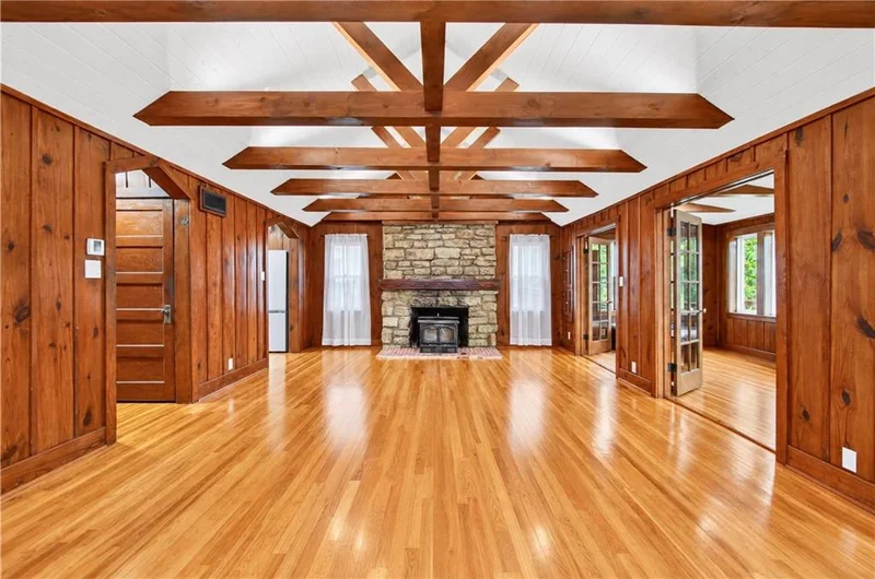 Great room looking back toward the stone fireplace