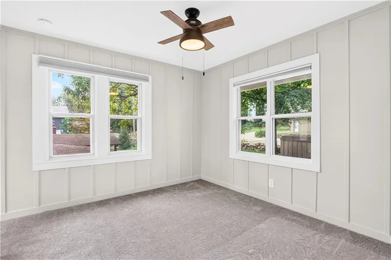 Lower-level bedroom with new carpet