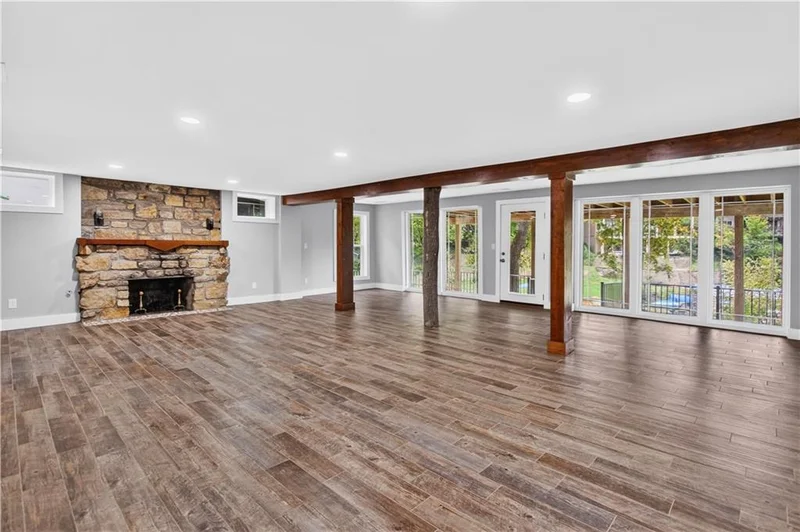 Walk-out lower level with a stone fireplace