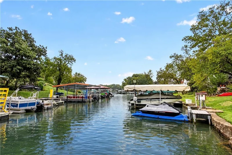 Covered boat docks lining the cove